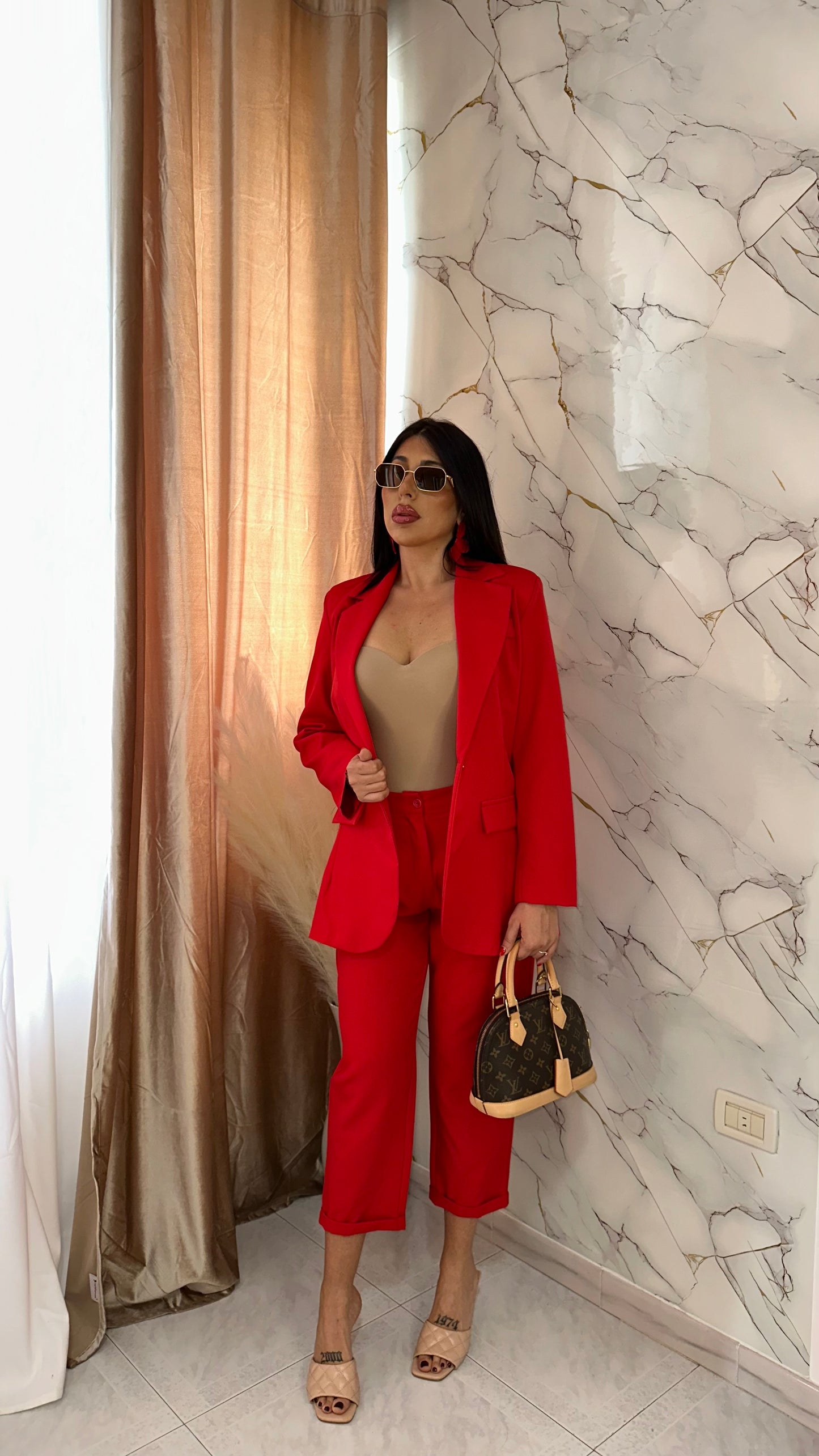 TAILLEUR ROUGE