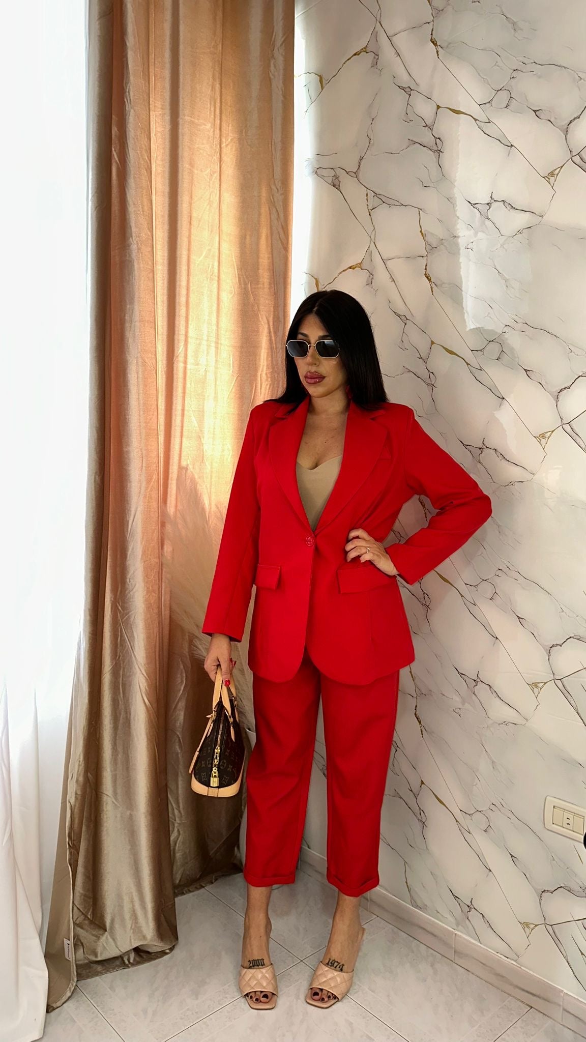TAILLEUR ROUGE